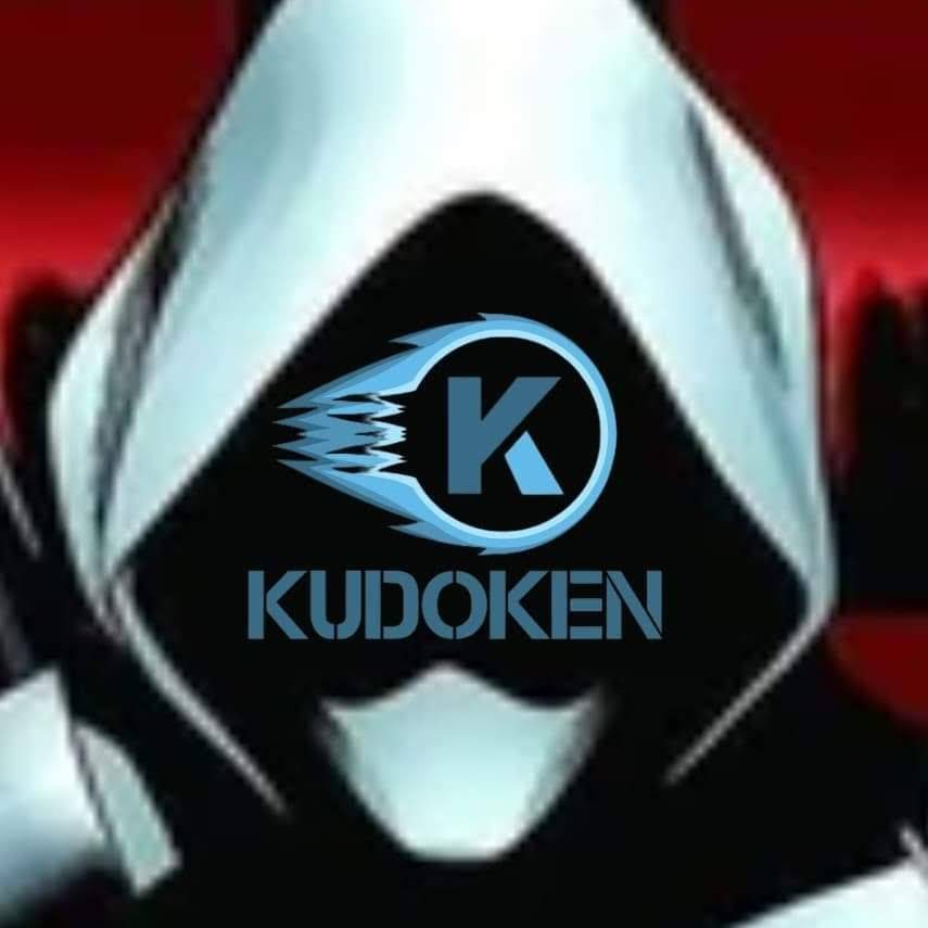 A hooded figure in white against red, the comet K logo where the face should be